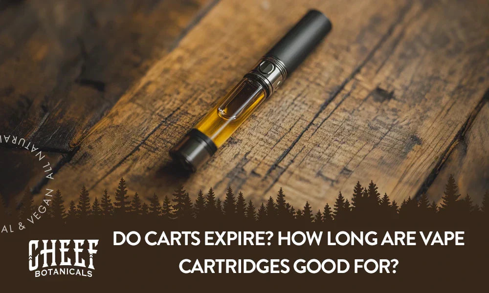 A vape cartridge sitting on a wooden table.