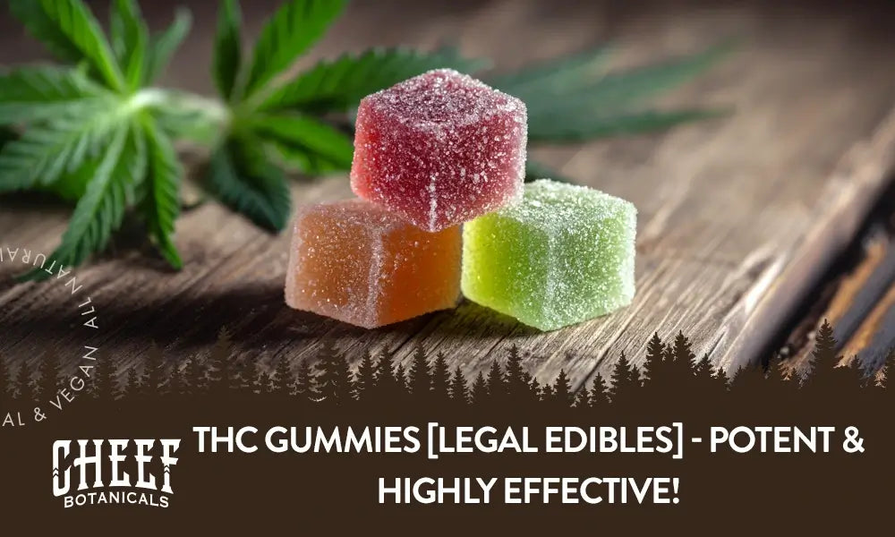 A couple of square THC gummies sitting on a wooden table.