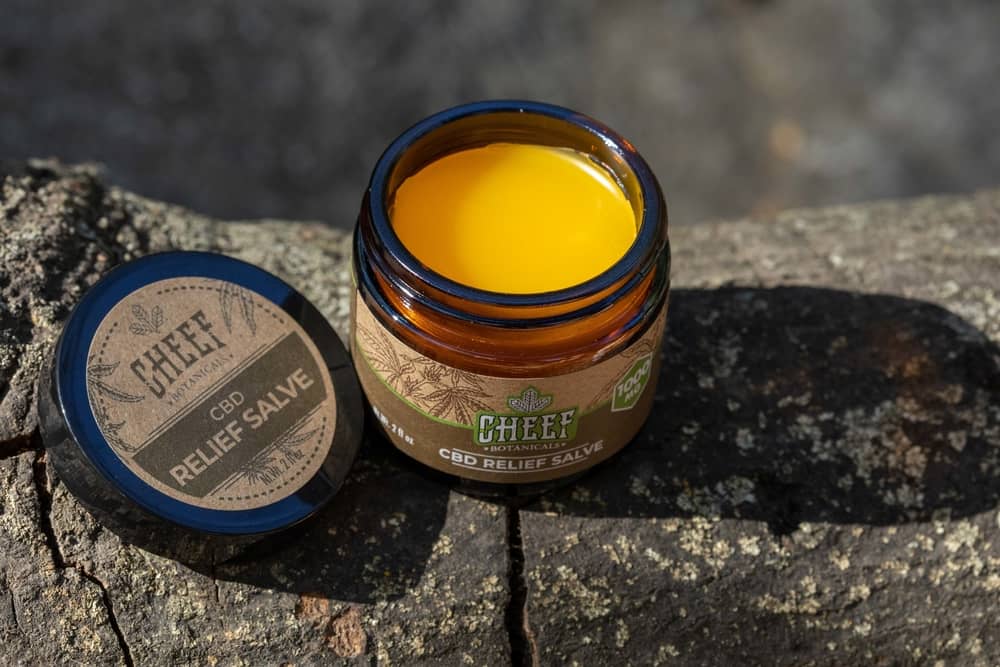 open jar of golden skin cream