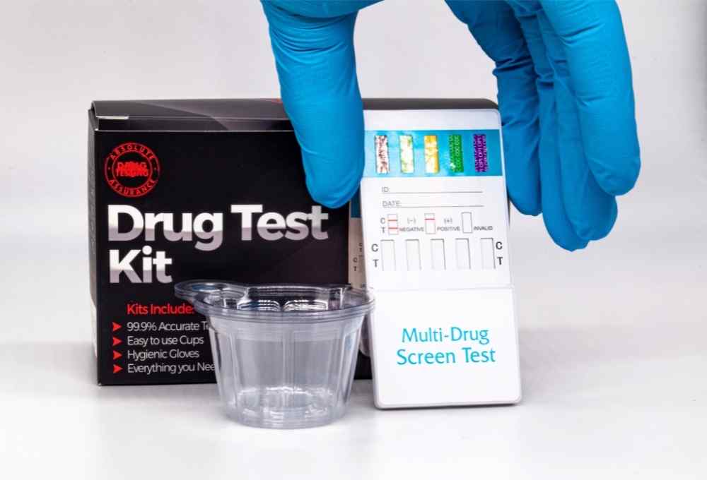 drug test on table gloved hand