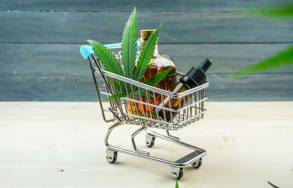 supermarket trolley with hemp and medical cannabis oil cbd