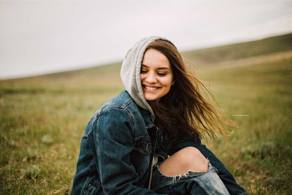 woman smiling in the plain