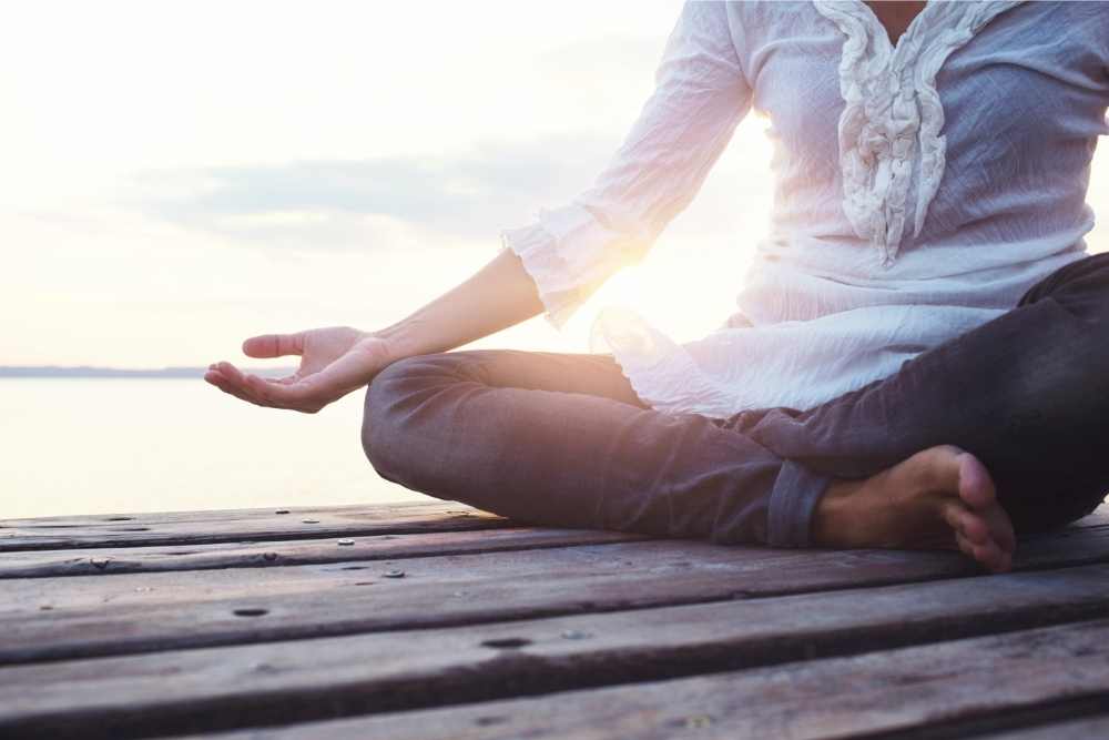 meditating by the water