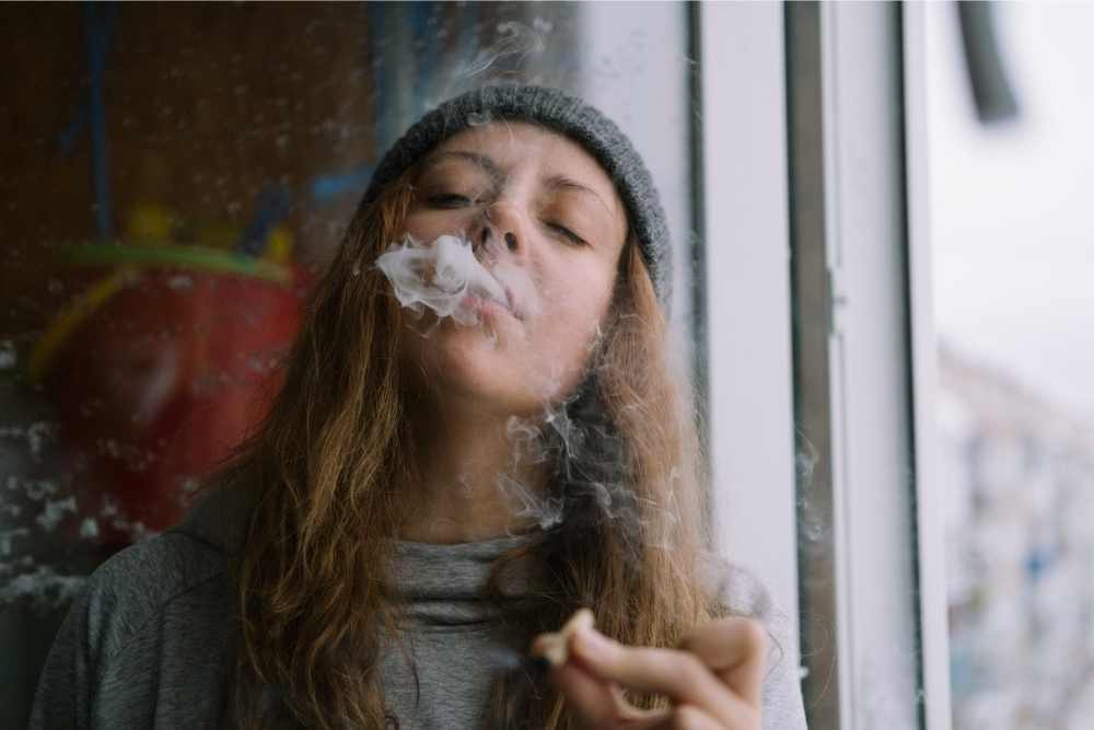 woman smoking cbd