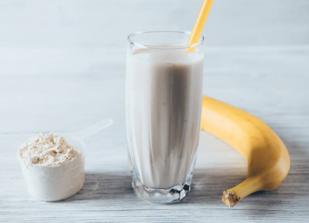 banana shake in glass with straw