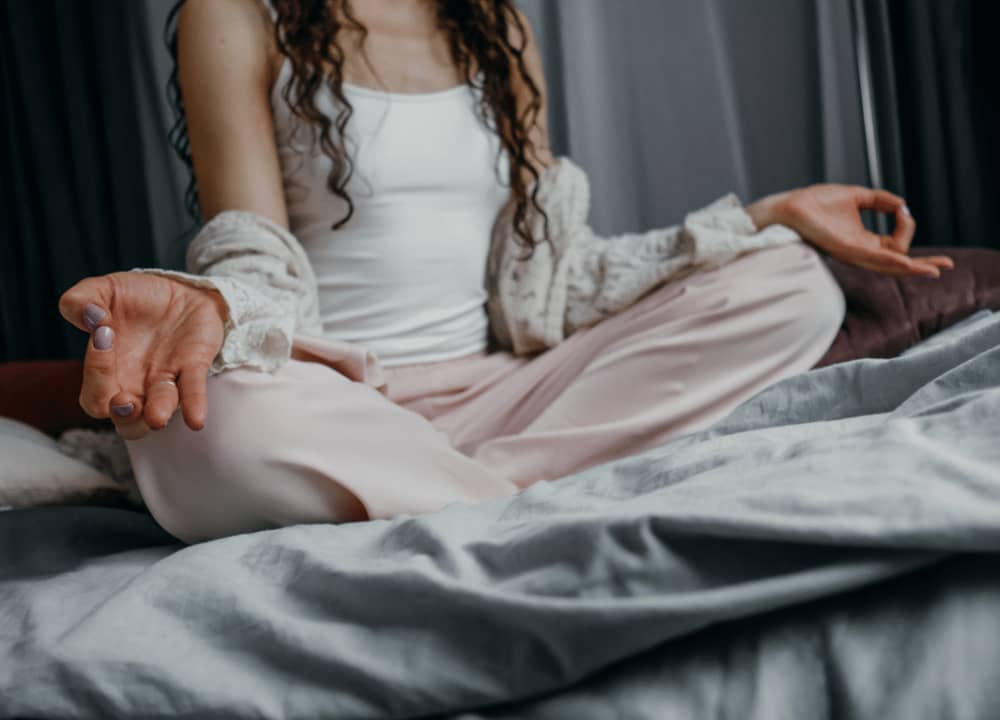 girl meditating before going to bed