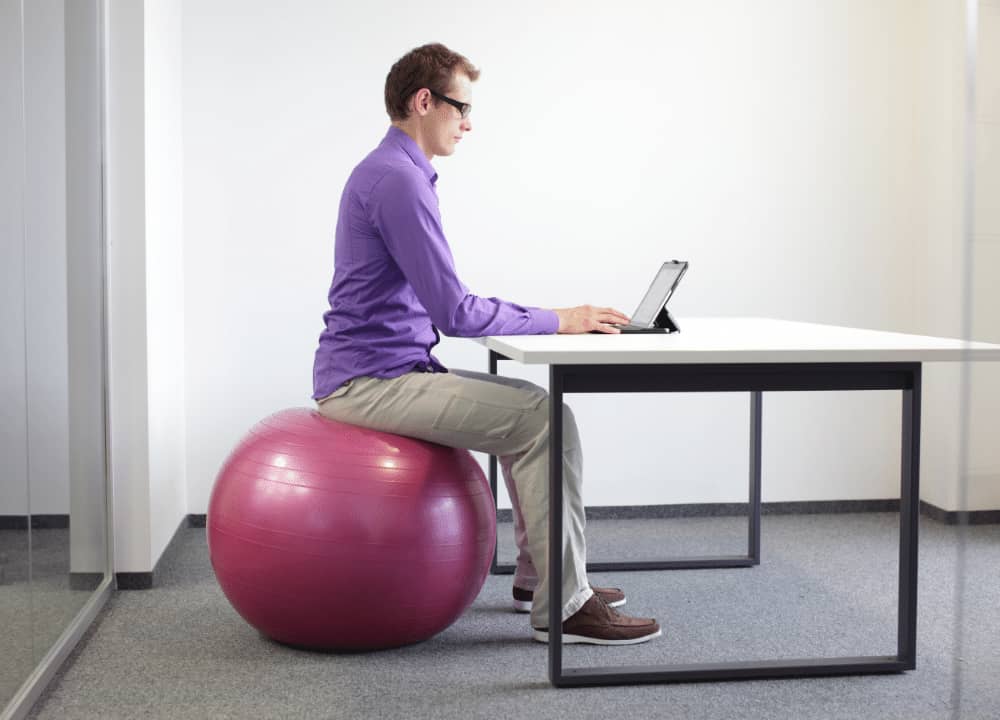 professional man on exercise ball