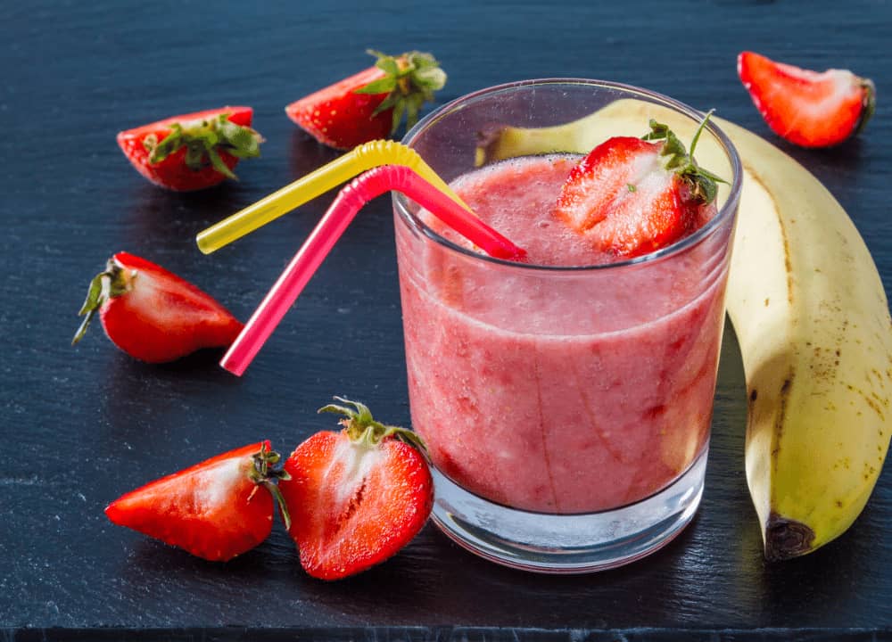 strawberry smoothie with colored straws