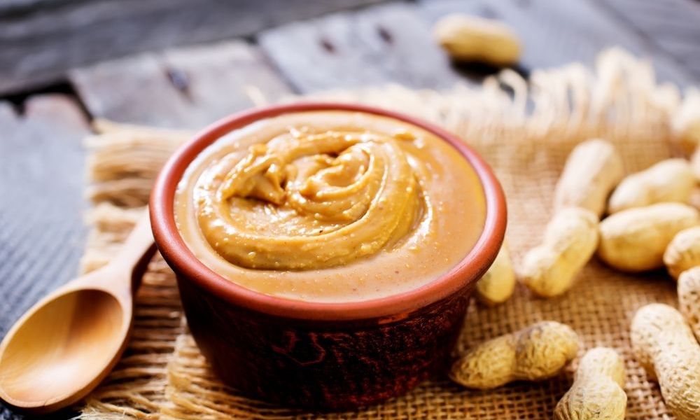 bowl of peanut butter with nuts