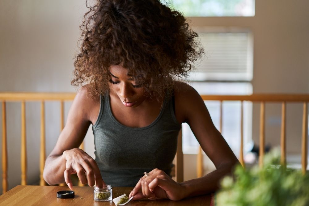 woman packing joint