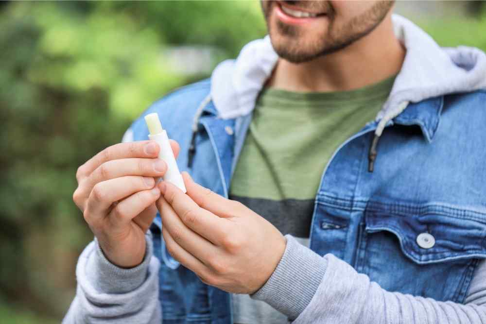 man holding cbd stick