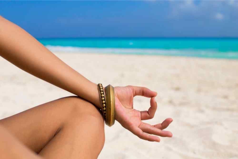 meditating on beach