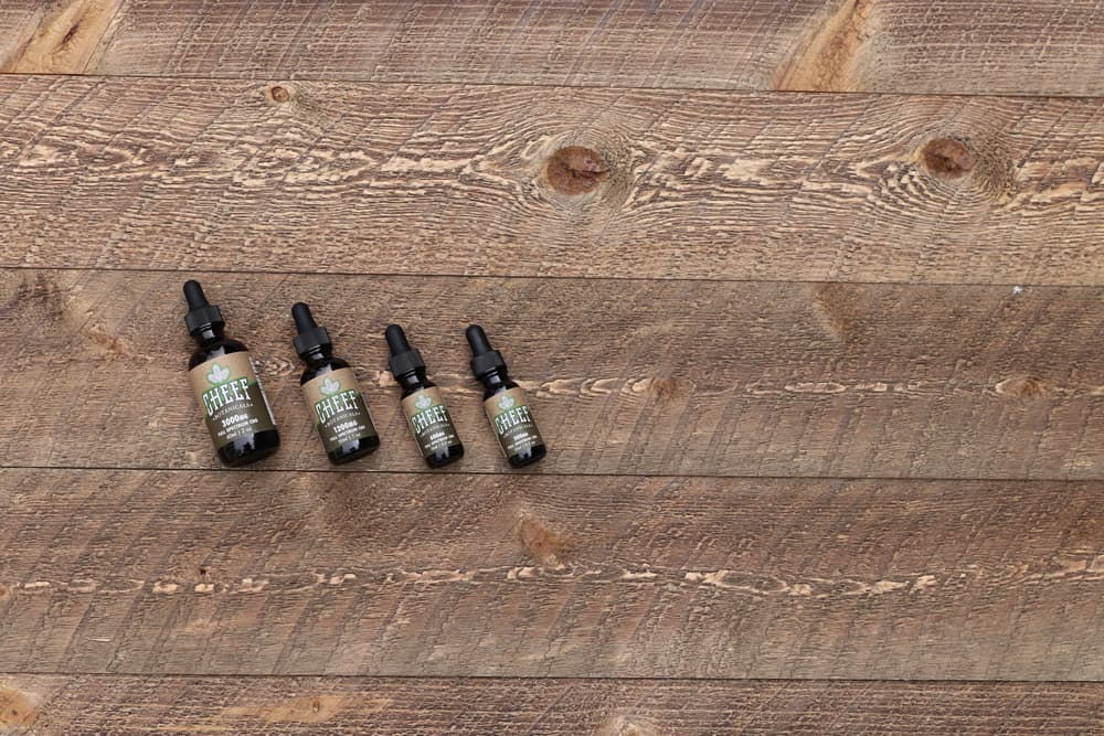 cbd-tinctures-on-wood-flooring