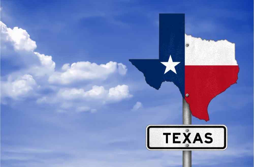 texas road sign clear blue sky