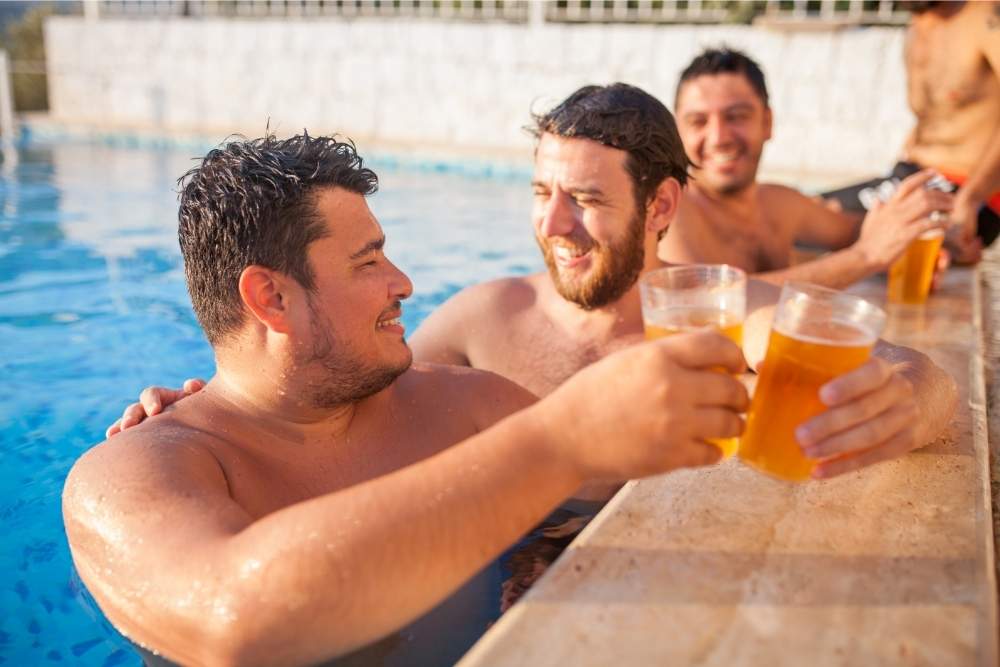 people-enjoying-a-cbd-drink-by-the-the-pool